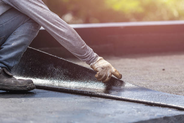 Professional Waterproofing technician working in Fayetteville, TN